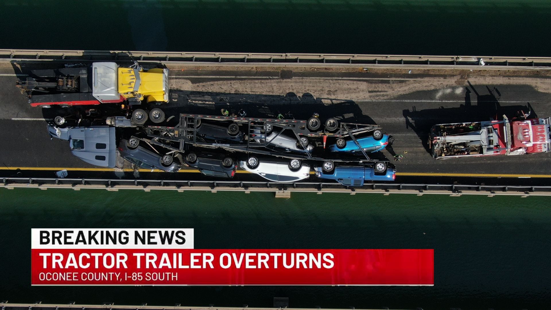 LIVE: Oil spills into Lake Hartwell after semi hauling cars overturns, closes I-85