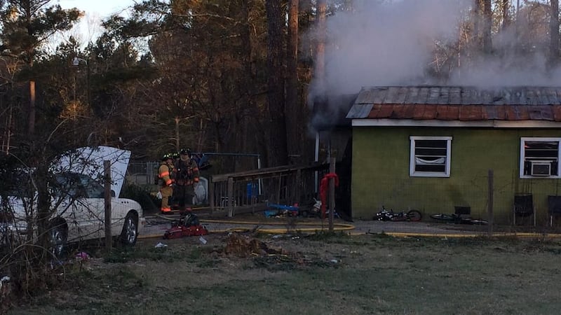 Investigators: Family displaced after wood-burning stove causes house fire