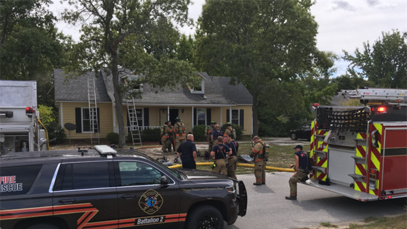 Firefighters worked to put out a house fire at the 200 block of Ivy Field Road. (Source;...