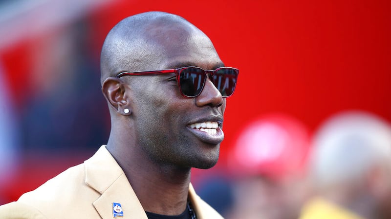 FILE - Former NFL wide receiver Terrell Owens is shown before an NFL football game between the...