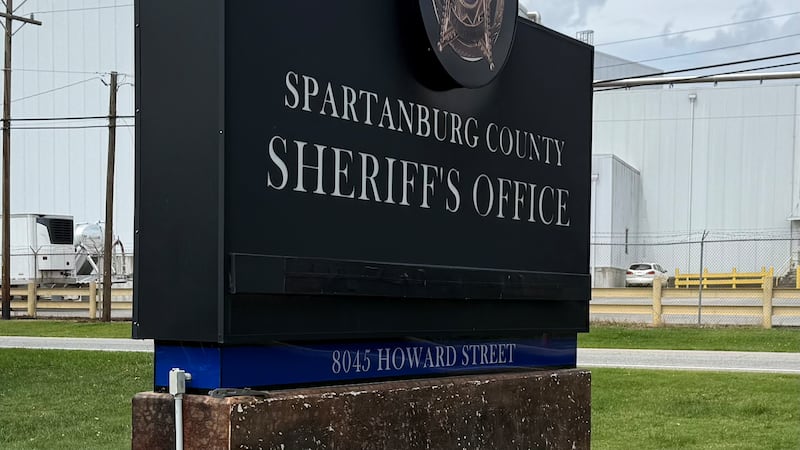 Sign for Spartanburg County Sheriff's Office. Chuck Wright's name has been covered with black...